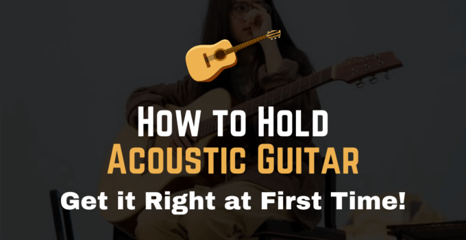 how to hold an acoustic guitar